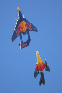 a Hunter being chased by a Red-Bull branded Sea Vixen