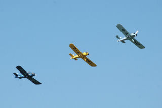 three coloured plains in a row